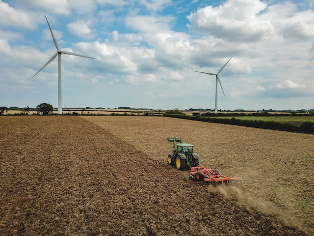 Tractor by wind turbines